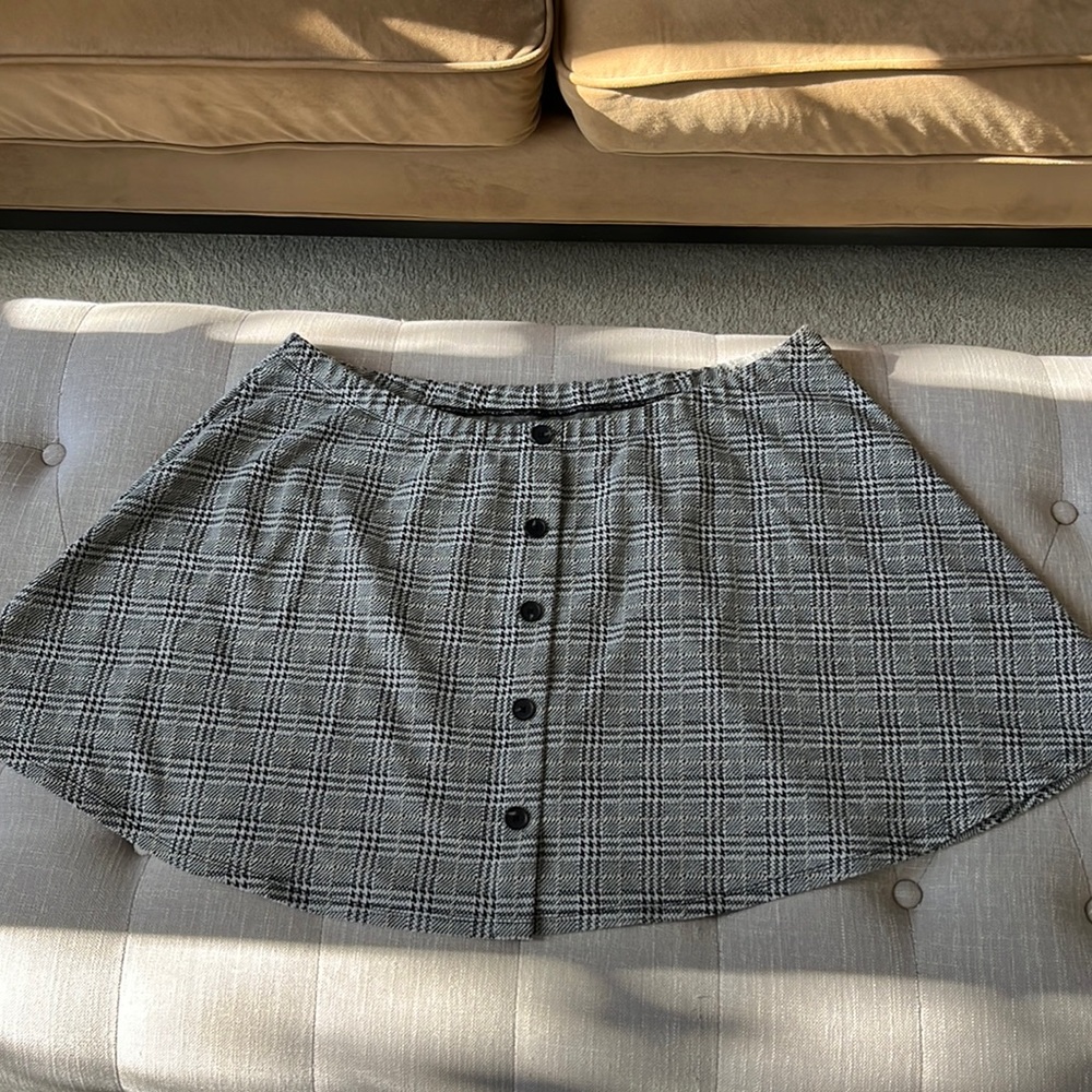 Vylette plaid skirt with faux button detail